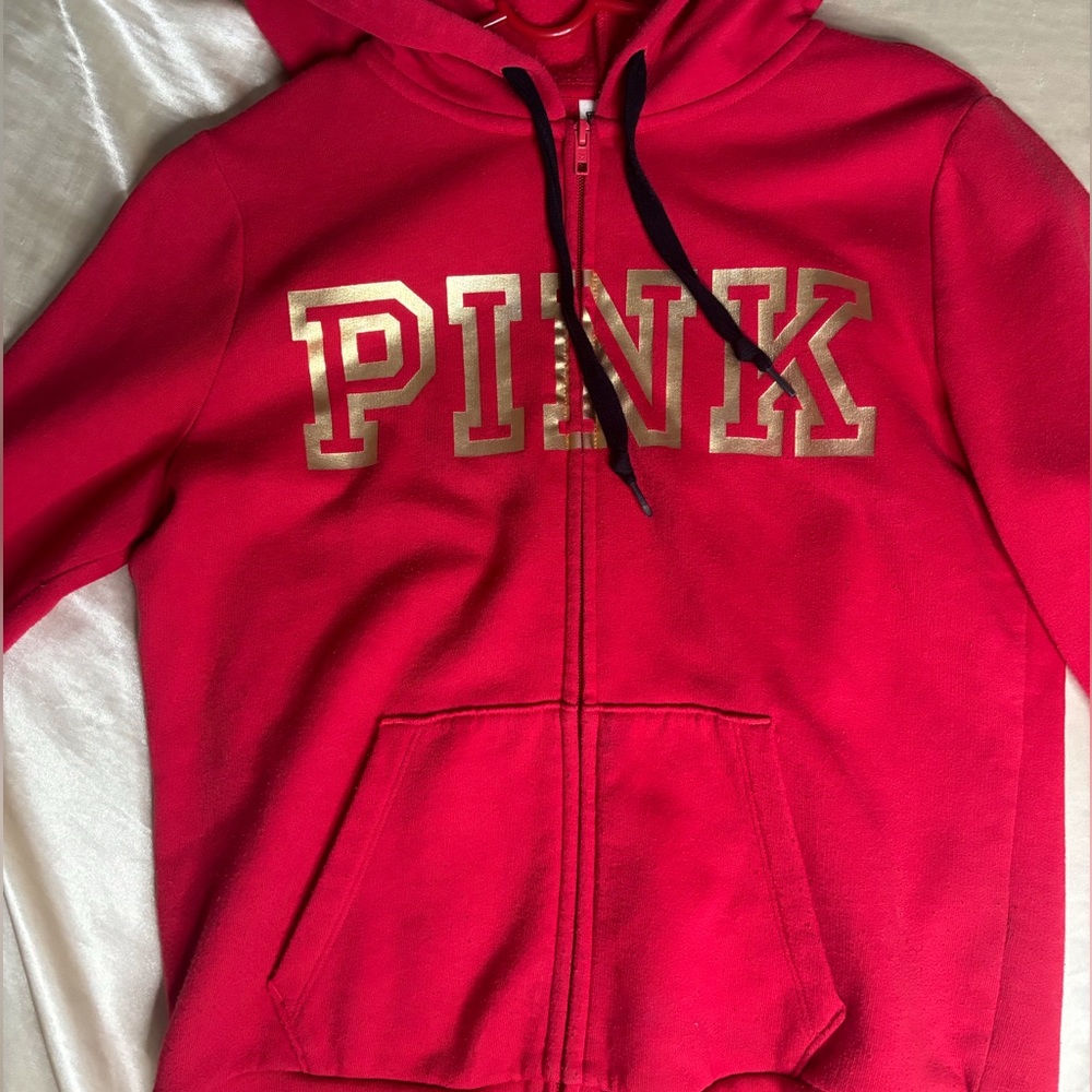 I’m selling this hot pink “Pink” hoodie.
